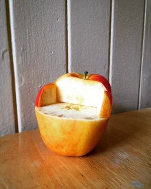 A small chair carved into an apple