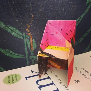 A miniature chair folded from colorful paper